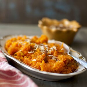 White oval bowl with gajar halwa