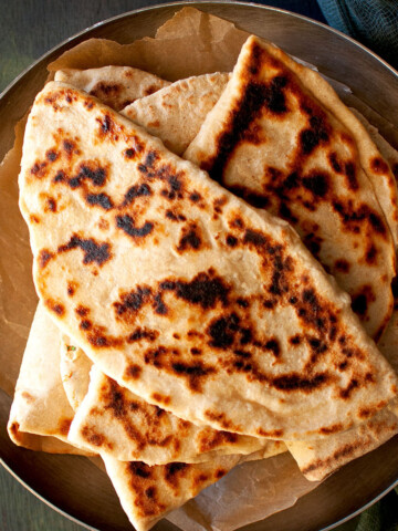 Tray with stack of potato bolani.