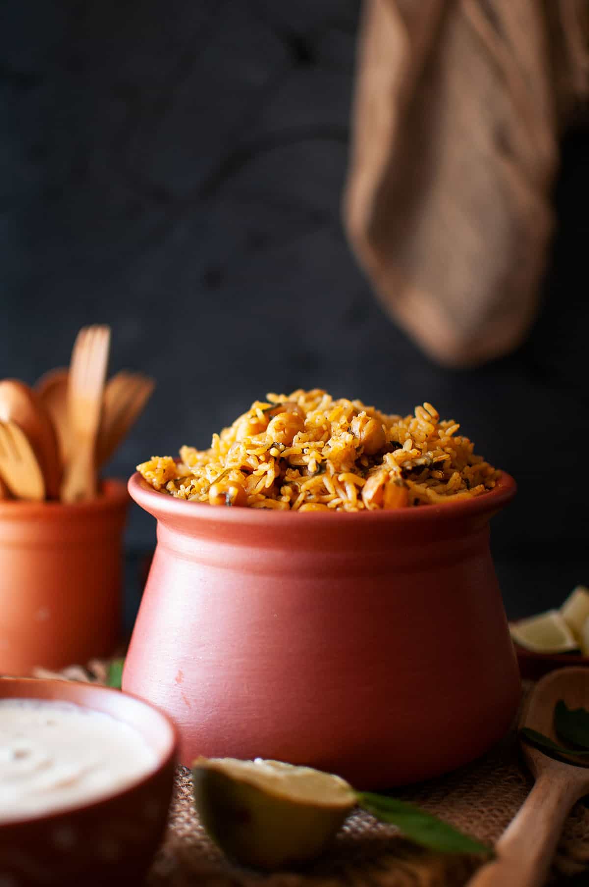 Terracotta bowl with methi chana pulao.