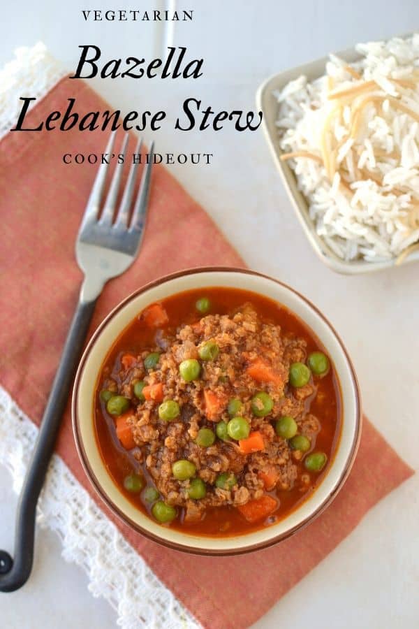 Bowl with vegetarian stew made with faux meat, carrots and green peas