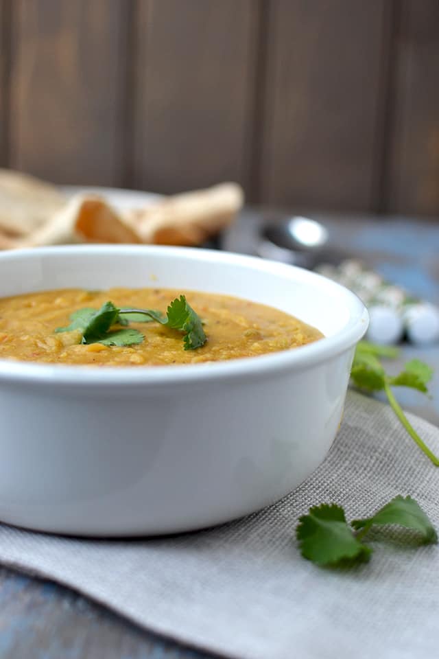 White bowl with Parsi lentil and vegetable stew