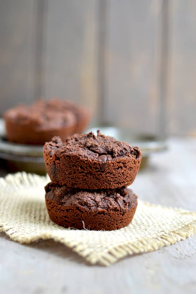 2 coconut flour chocolate muffins stacked on top of each other