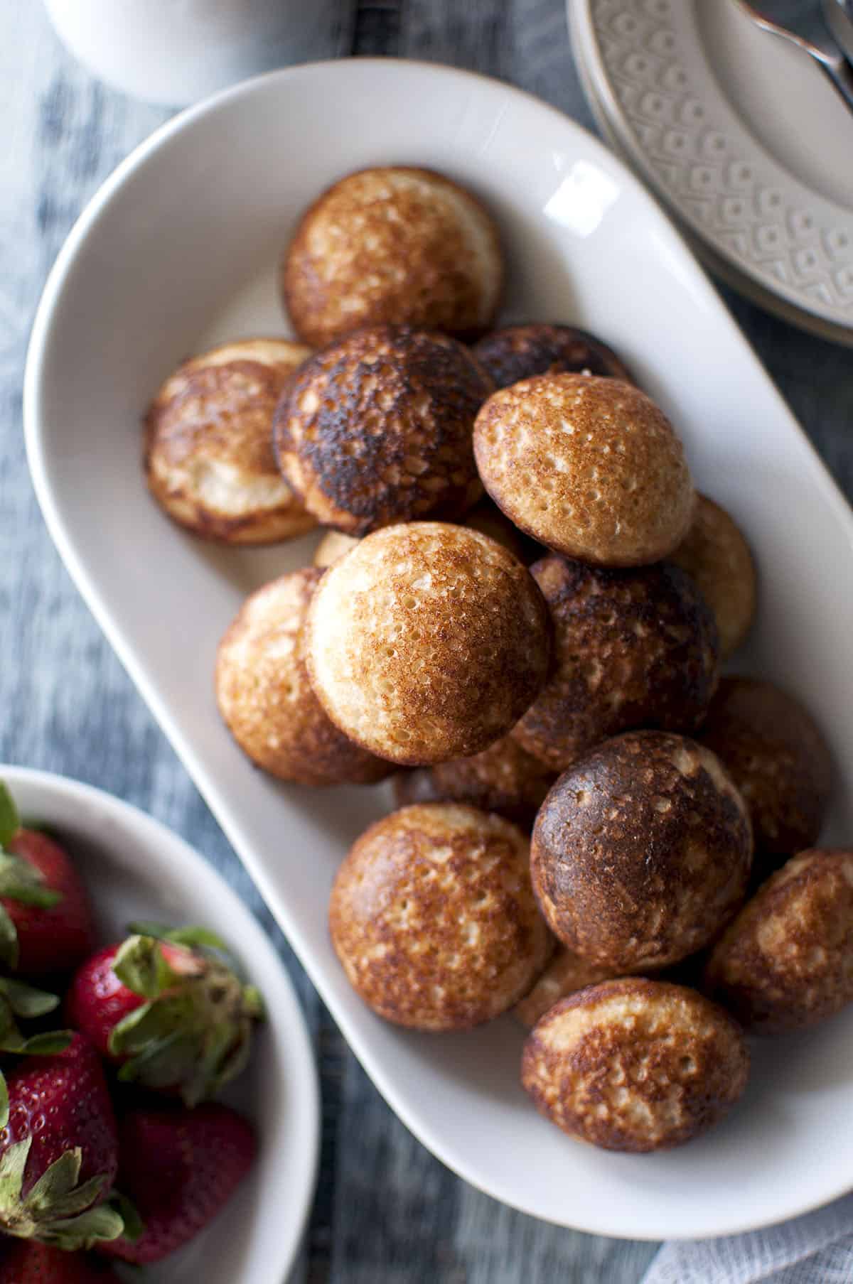 White bowl with a stack of Madagascar pancakes