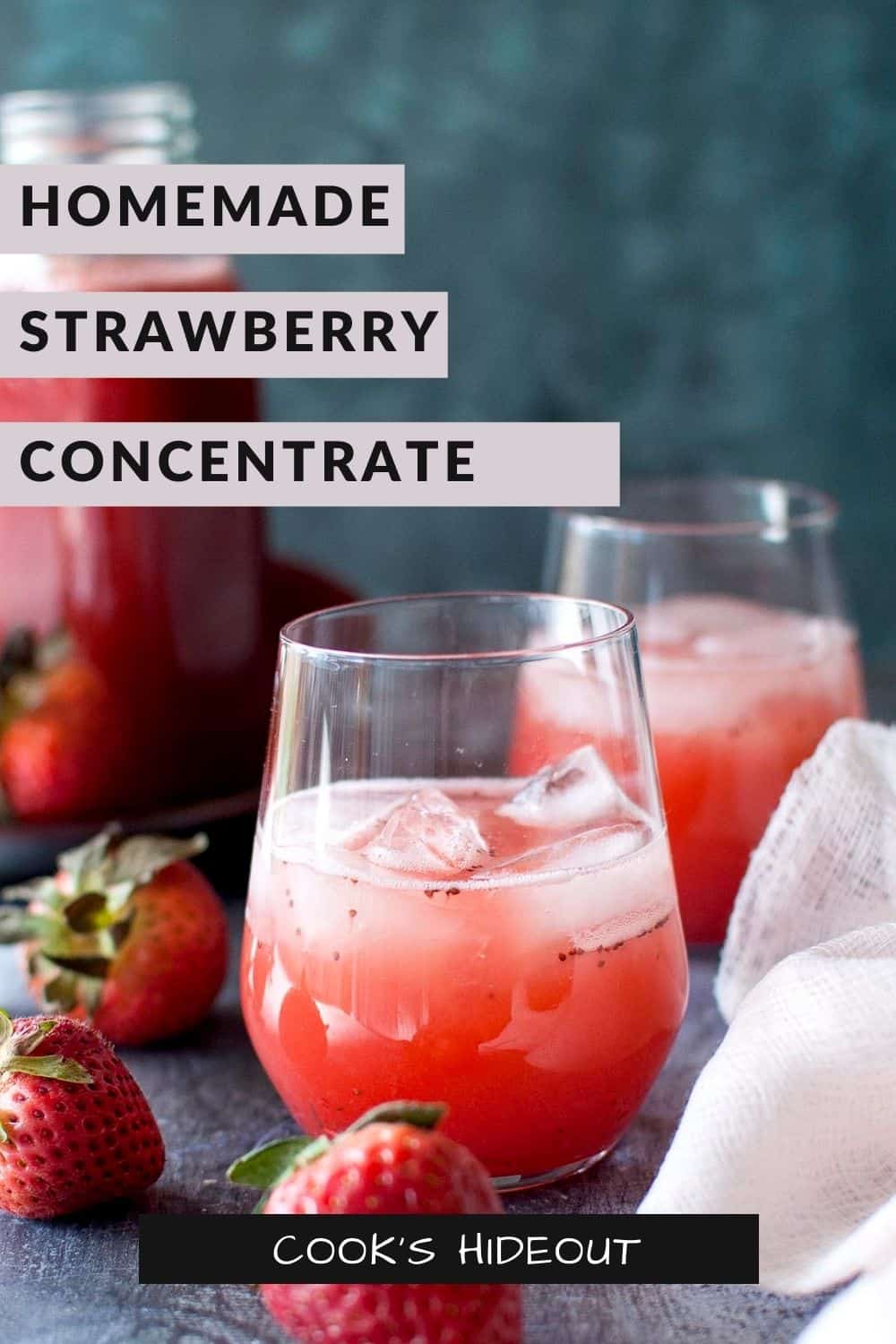 Strawberry juice in a glass with ice cubes