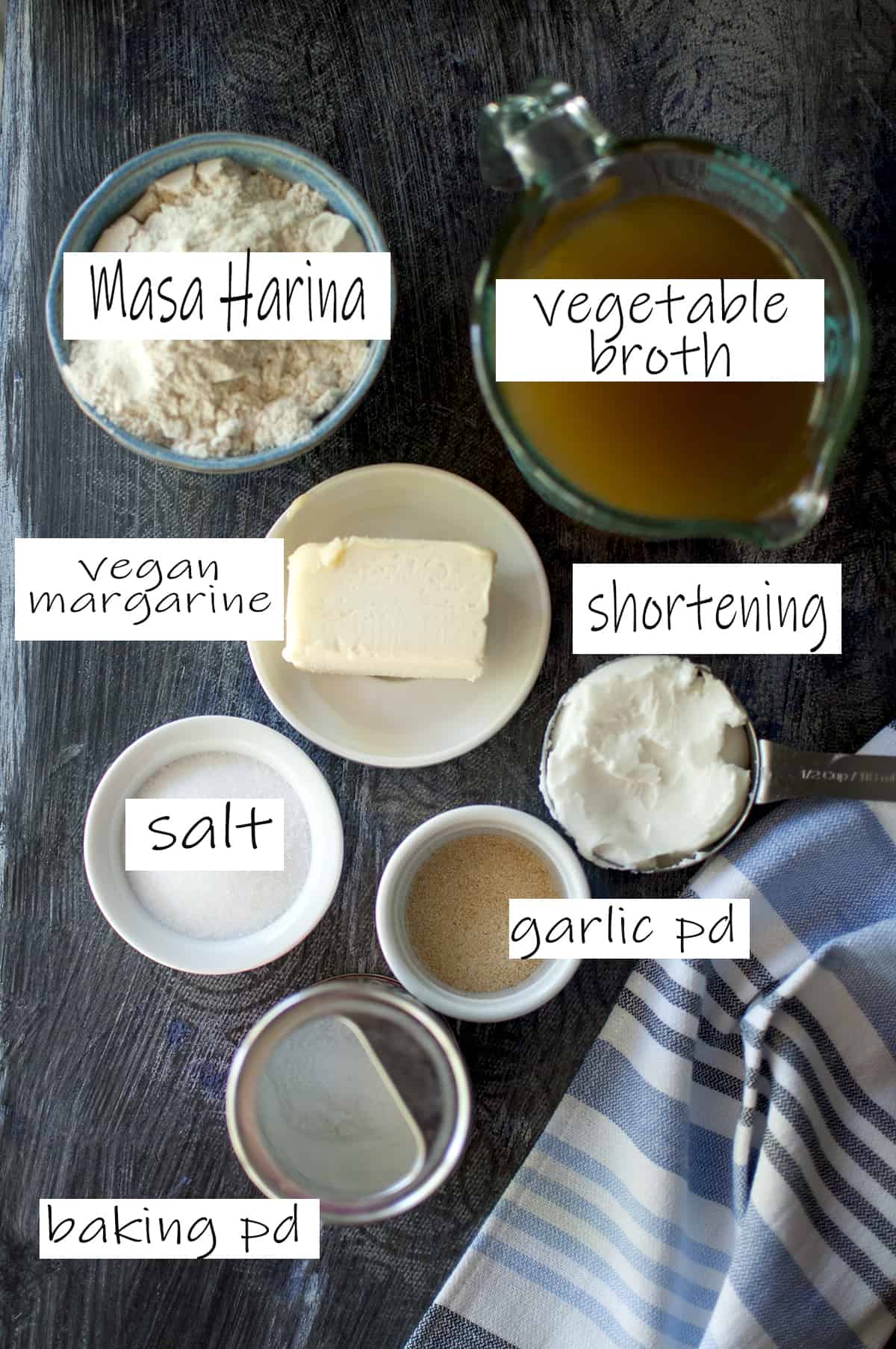 Ingredients for the dough - masa harina, margarine, shortening, vegetable broth, garlic powder, salt, baking powder