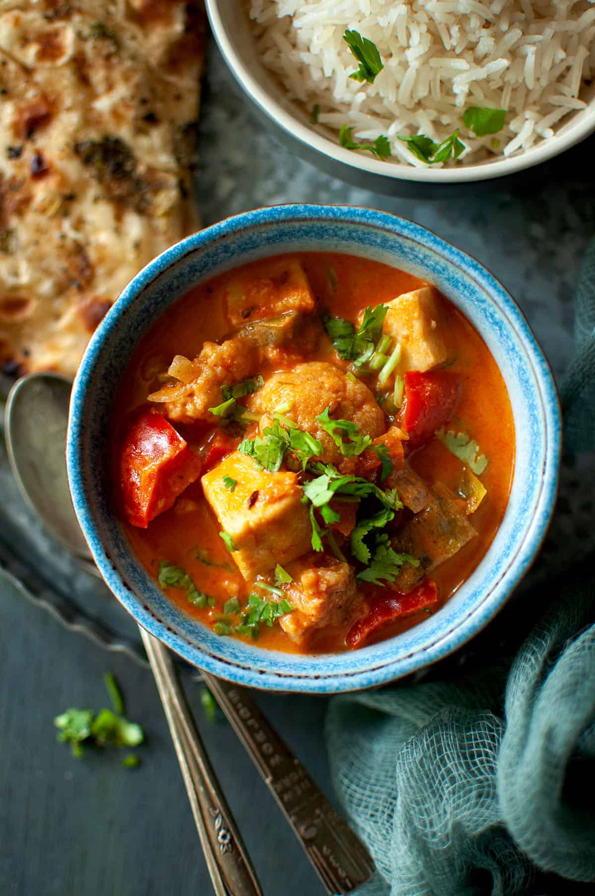 Blue bowl with mix vegetable curry.