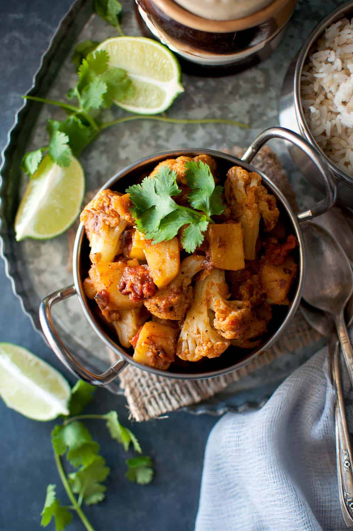 Top view of steel bowl of Instant Pot aloo gobi sabji