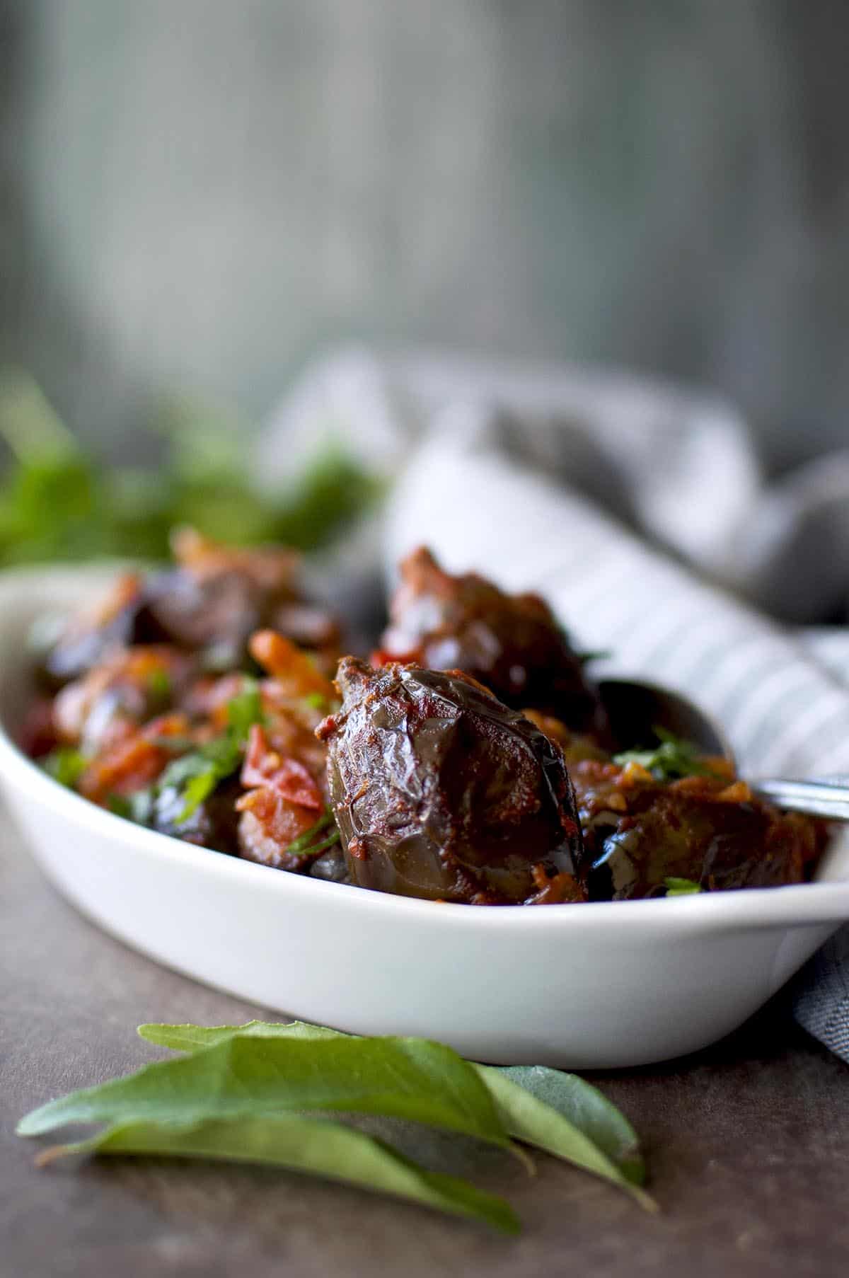 White bowl with baby aubergine curry