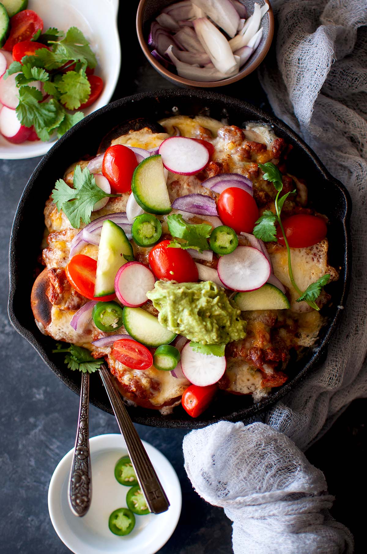 Cast iron skillet with vegetarian nachos.