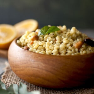 Wooden bowl with Barley Pulihora