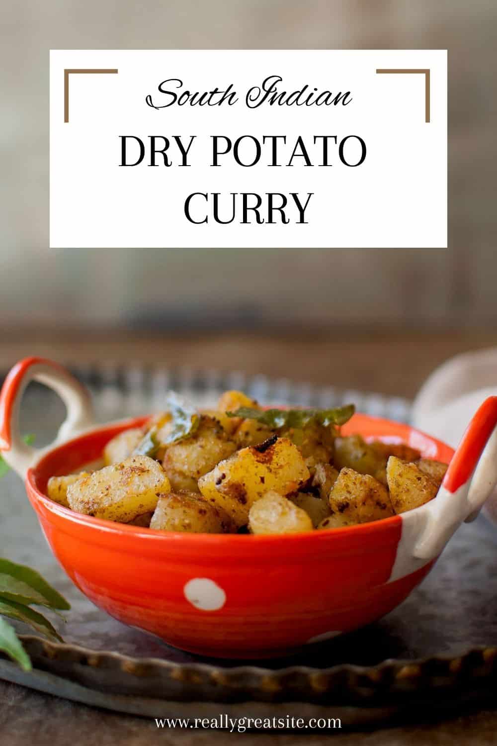 Orange bowl with dry potato curry.