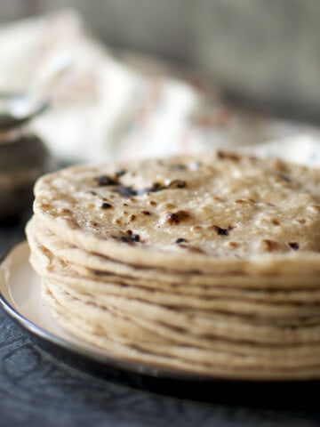 White plate with Stack of roti