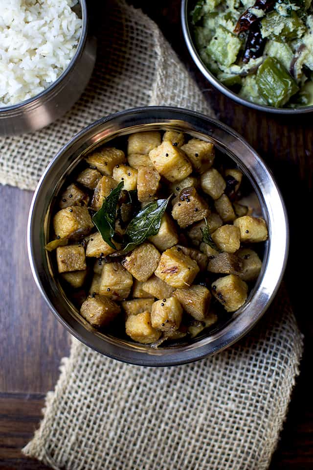 Bowl of Yam Fry with rice and cucumber curry