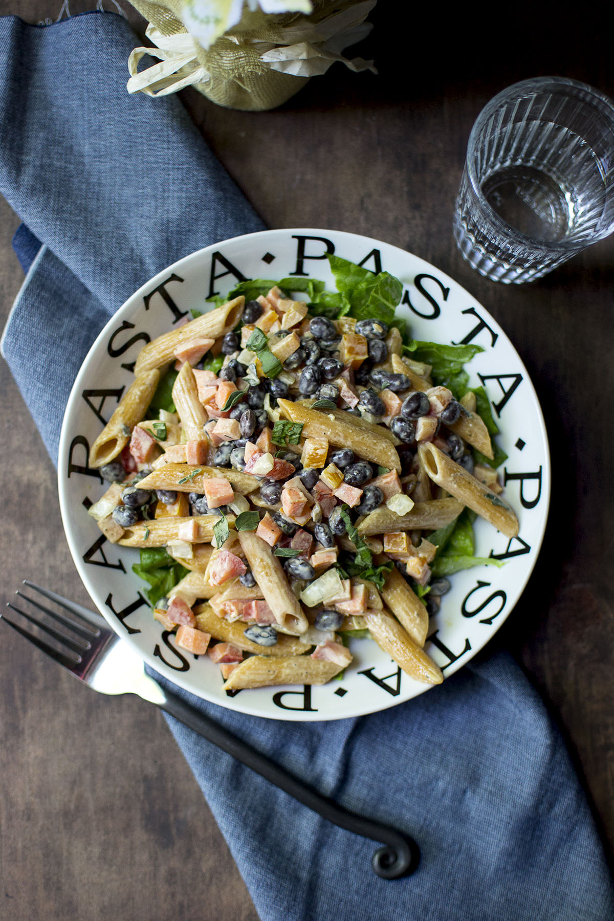 White Pasta bowl with salad and beans