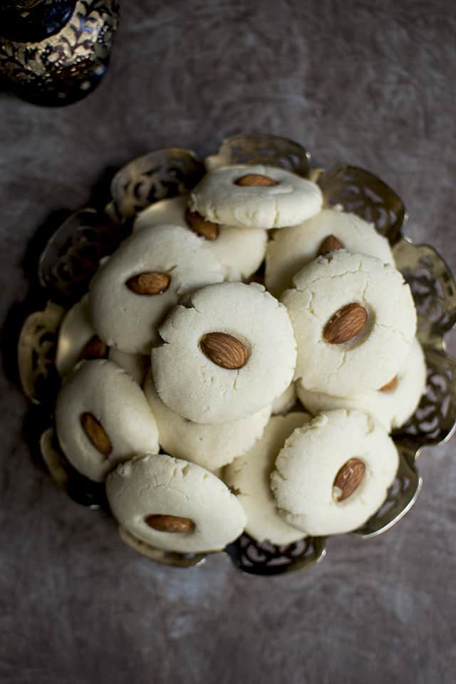 Plate of Almond topped Egyptian Ghorayebah cookies