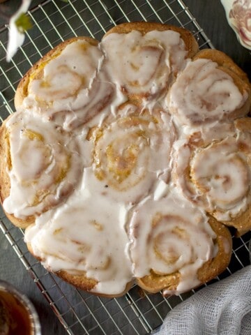 Top view of mango cinnamon rolls on a wire rack