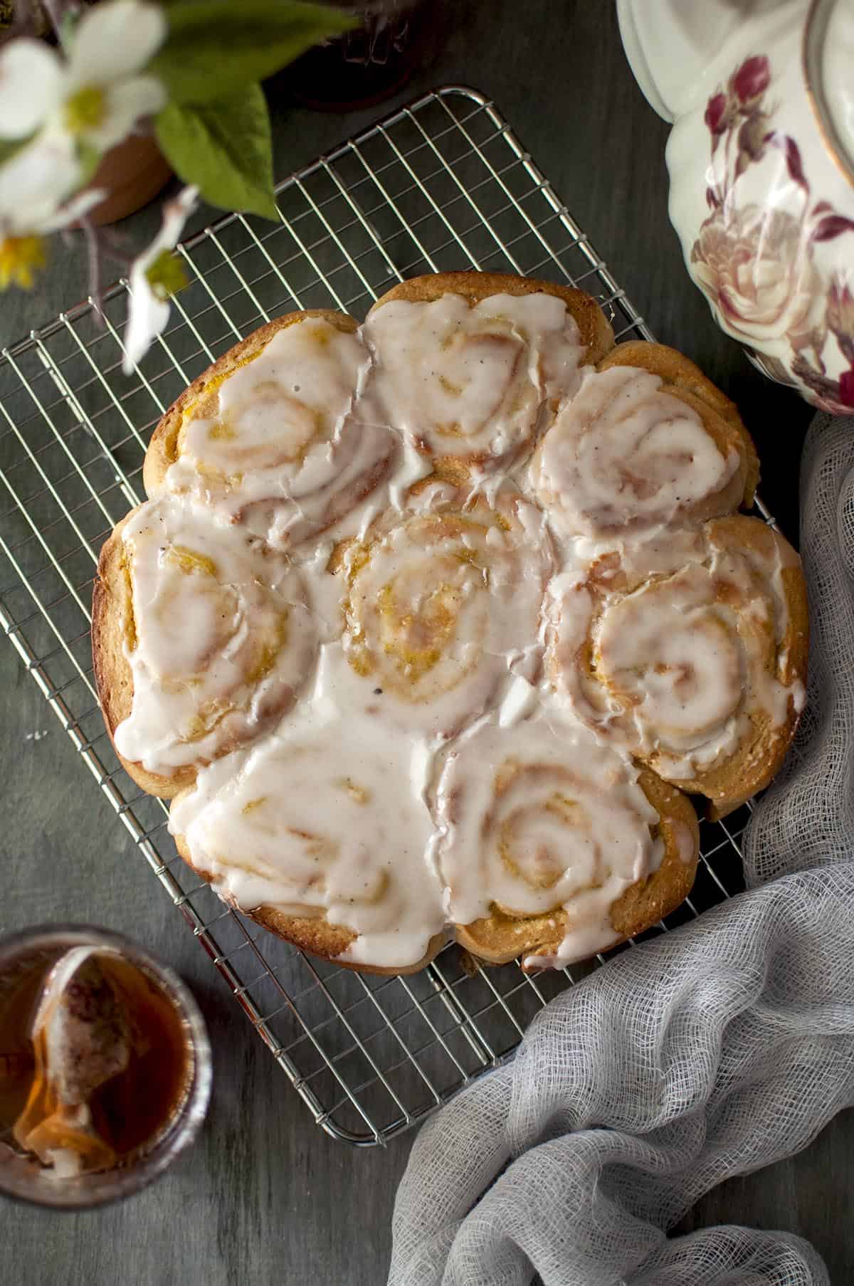 Top view of mango cinnamon rolls on a wire rack