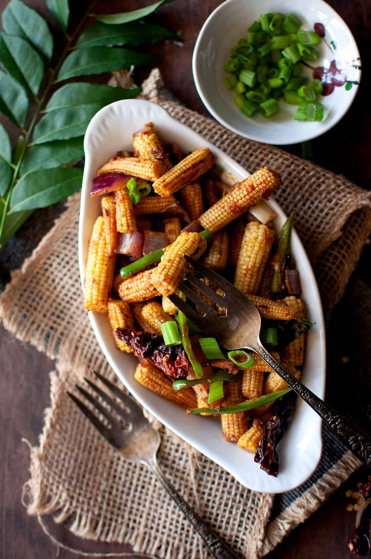 White bowl with vegetable stir fry.