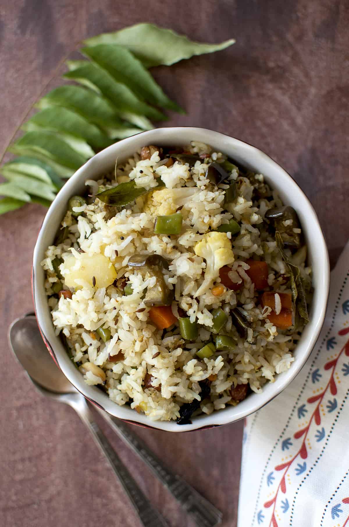 Dasara recipe - mixed vegetable rice served in white bowl