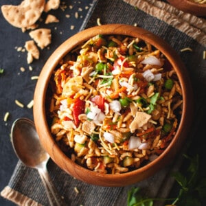 top view of wooden bowl with bhelpuri.