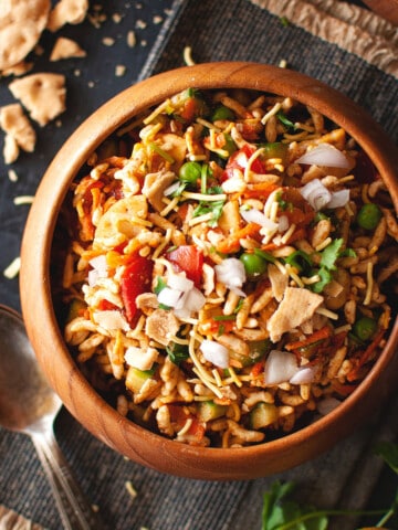 top view of wooden bowl with bhelpuri.