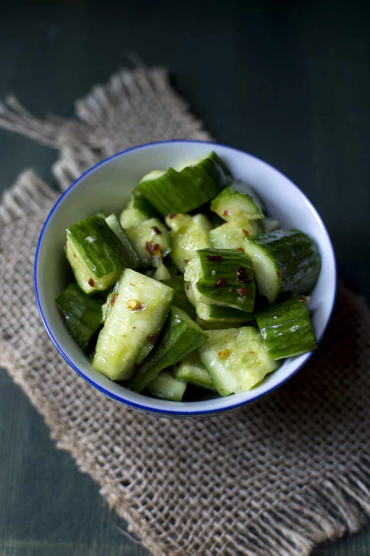 white bowl with cucumber salad