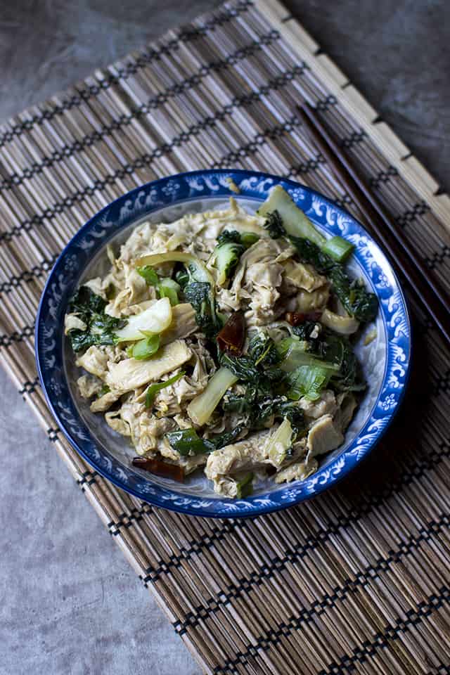 Blue bowl with Chinese bean curd skin bok choy stir fry