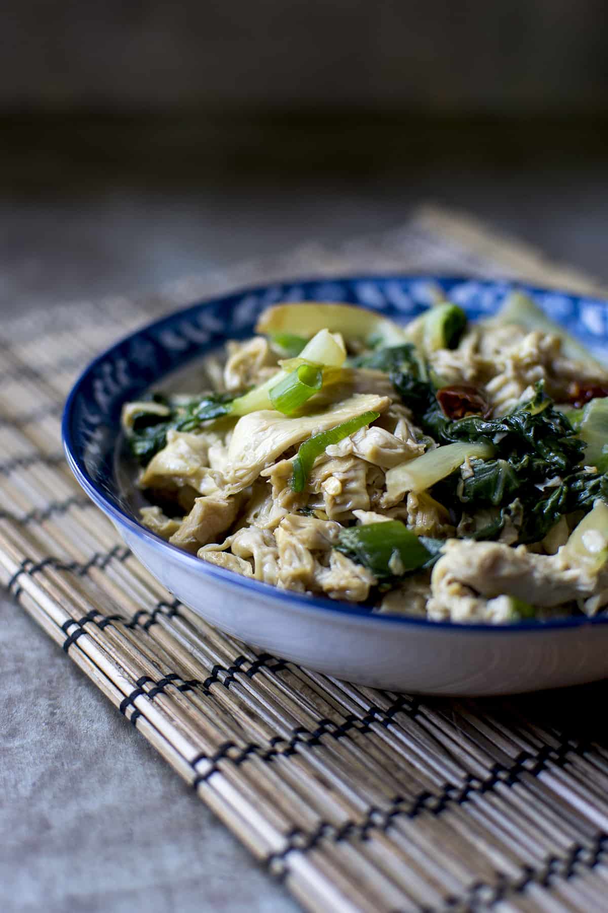 Blue bowl with yuba, bok choy stir fry