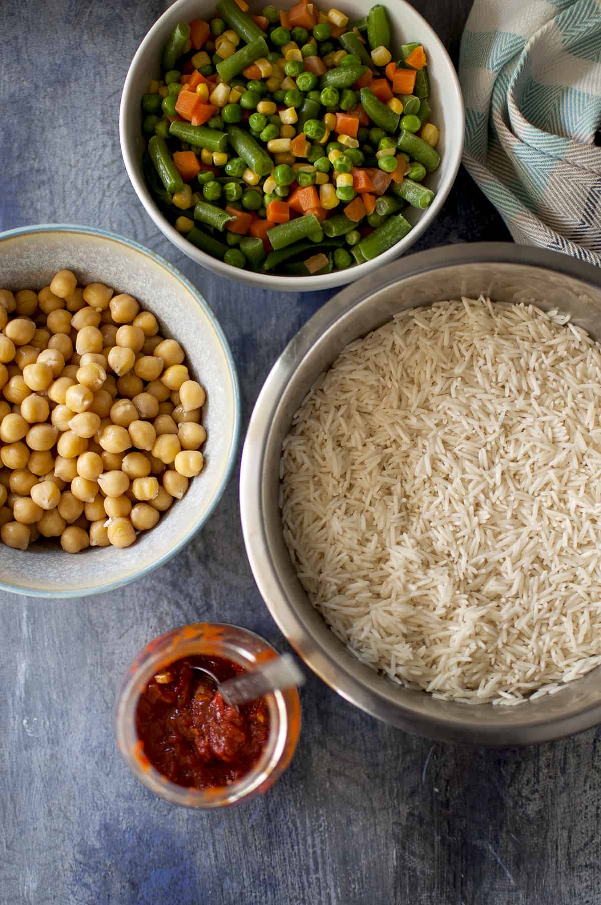 Required Ingredients for achari pulao - mixed vegetables, rice, chickpeas and chutney