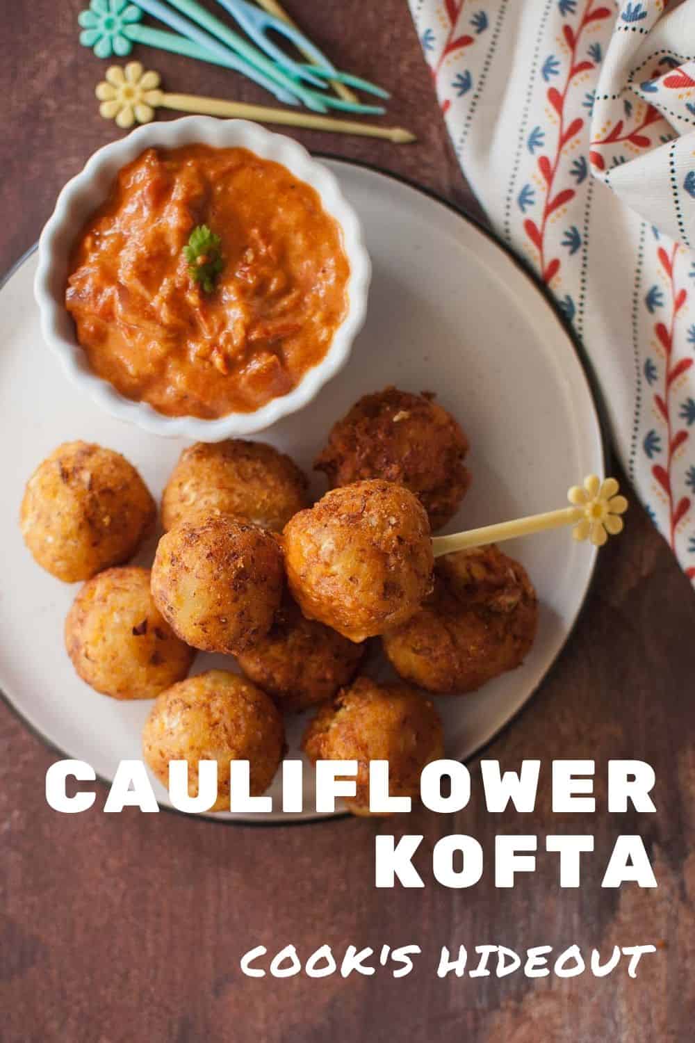 White plate with veggie balls and tomato sauce in a bowl