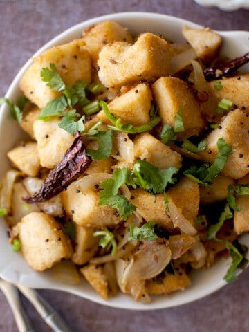 White Plate with Masala Idli