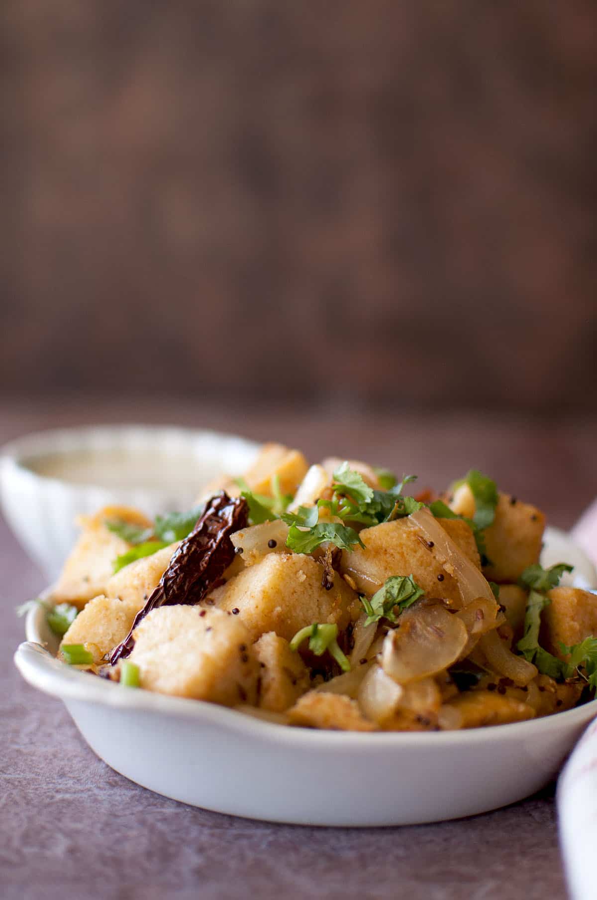 White plate with Idli seeyali