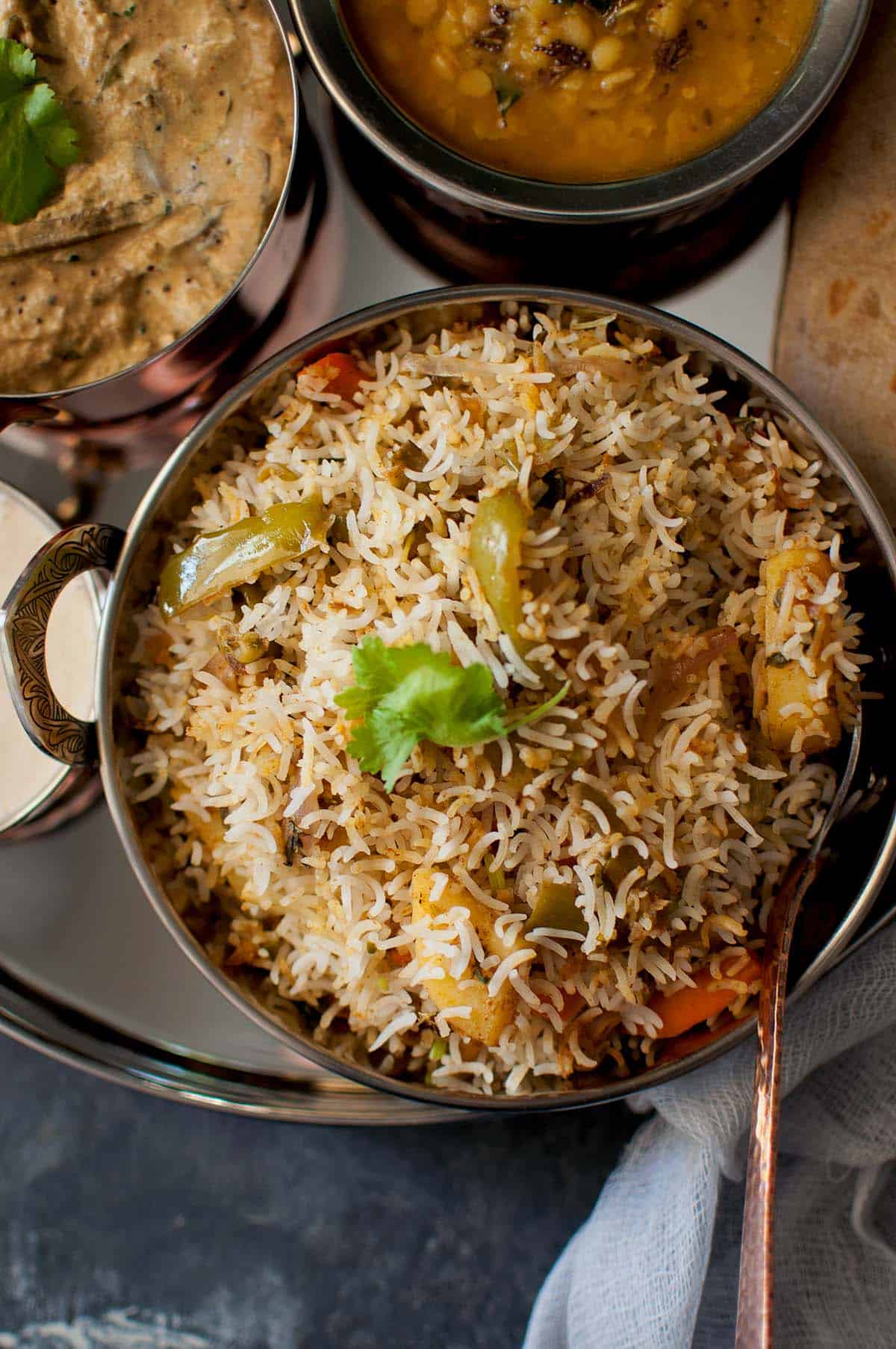 Steel bowl with Hyderabadi veg biryani