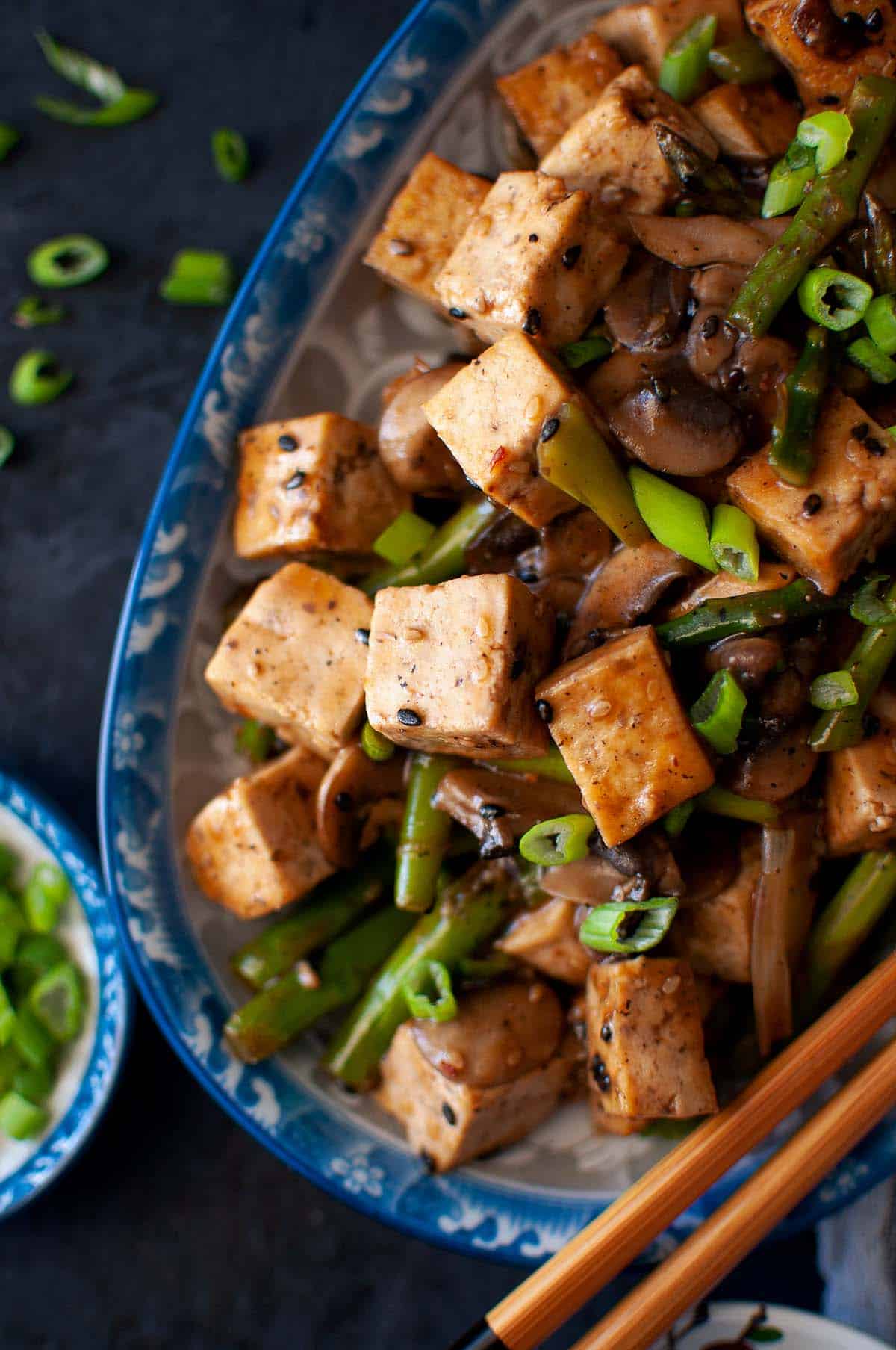 Blue platter with Tofu asparagus stir fry.