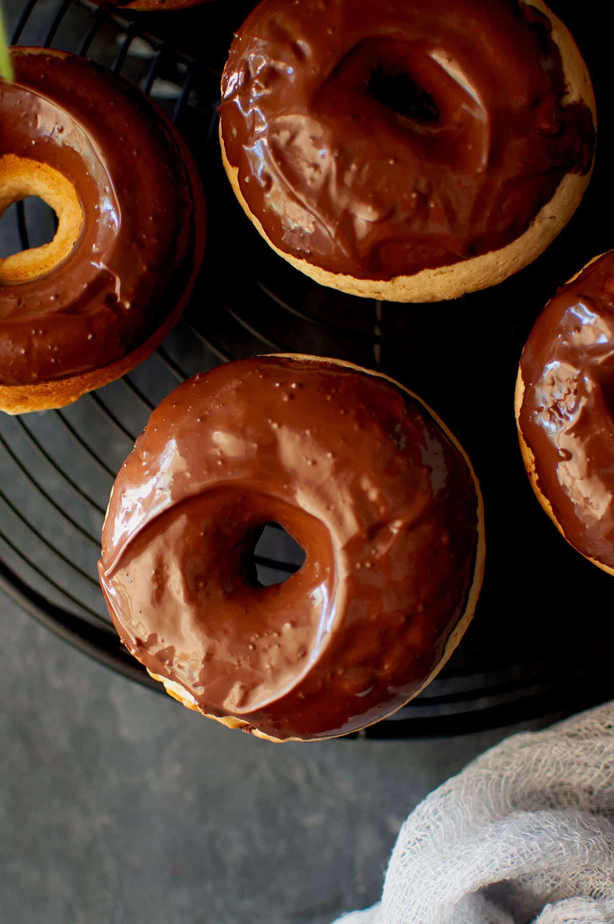 Top view of chocolate glazed donuts.
