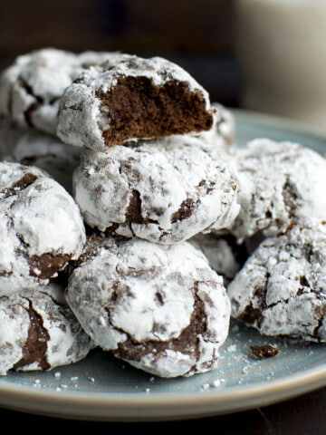 Blue plate with a stack of chocolate cookies