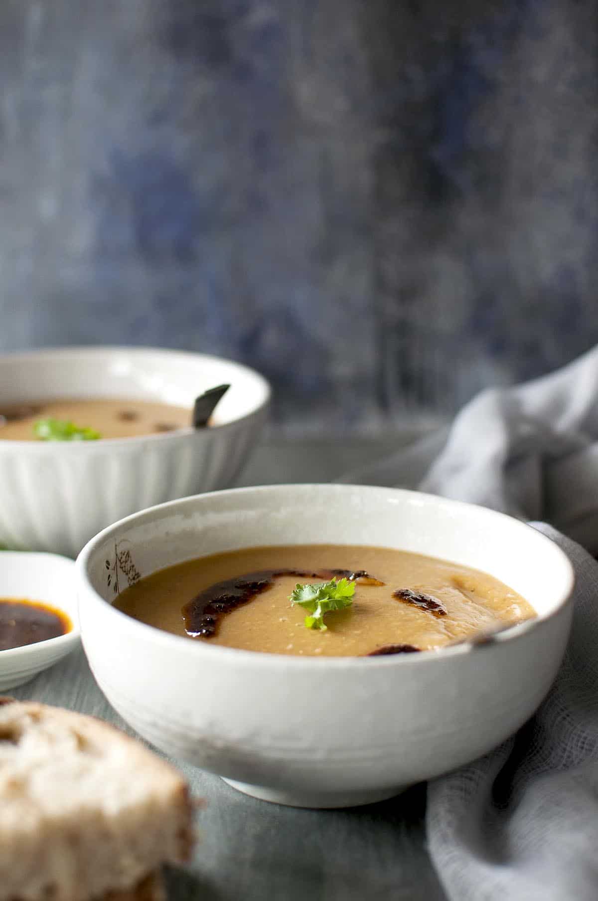 White bowl with creamy lentil soup