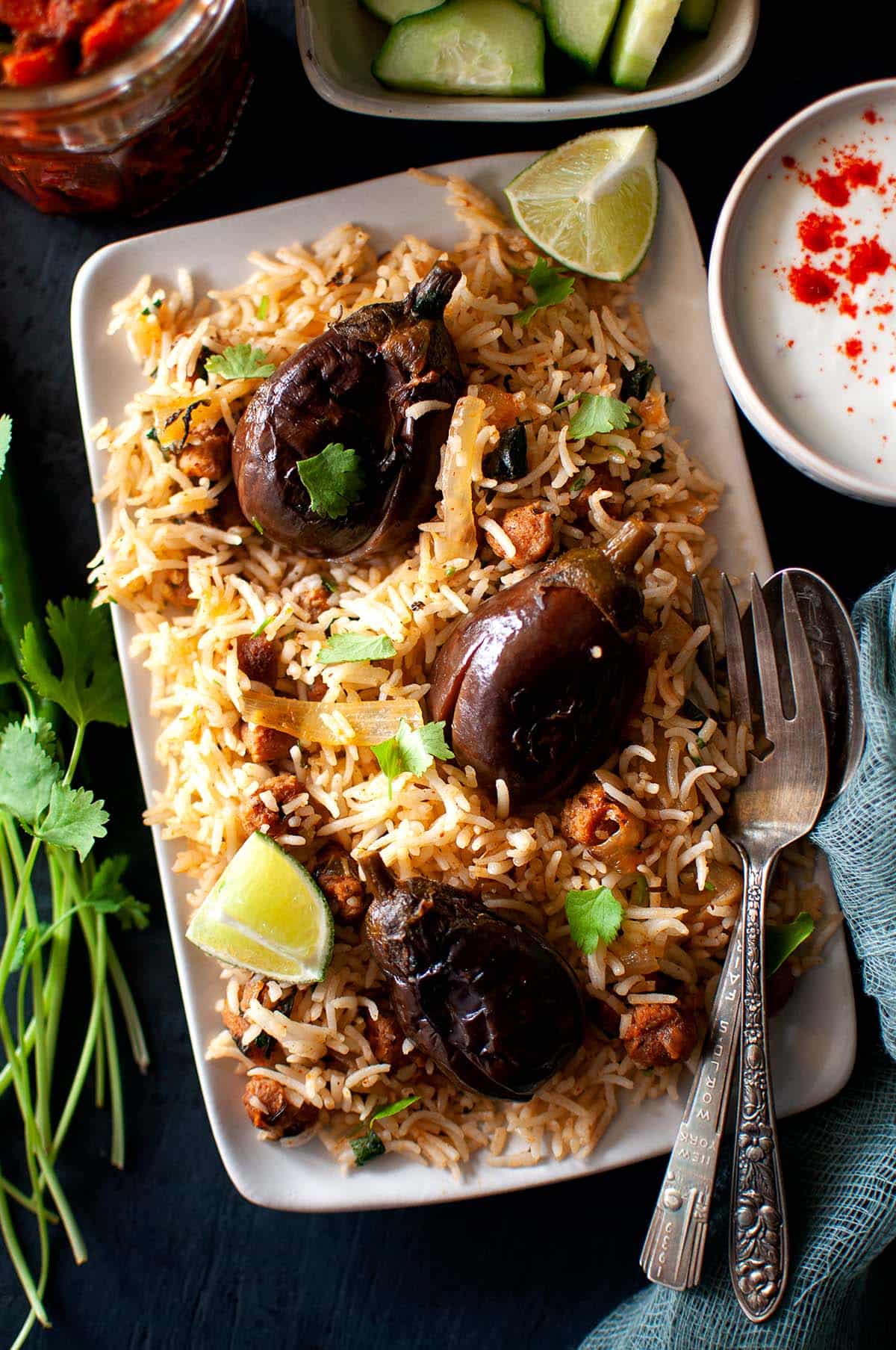 Top view of rectangle plate with eggplant pilaf.