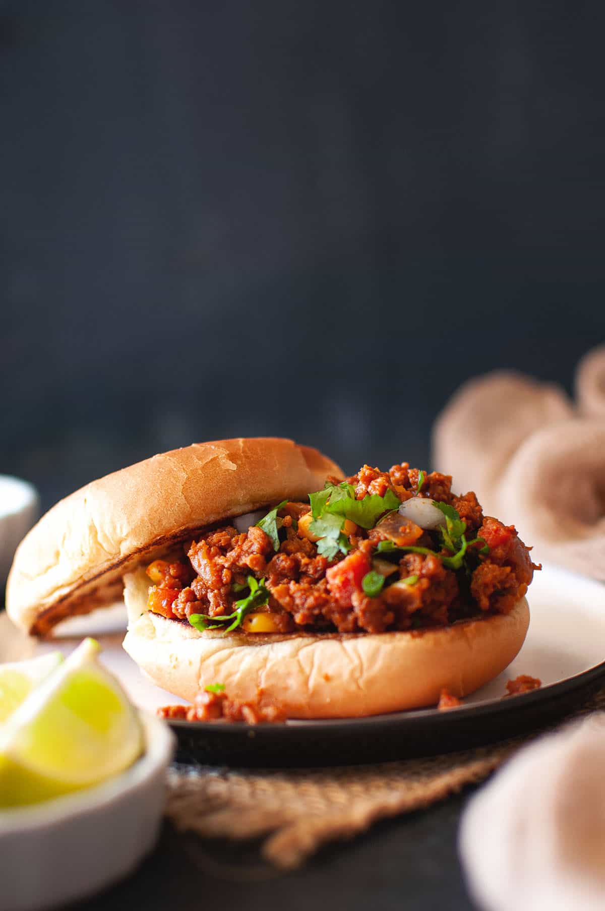 Black plate with Indian sloppy joes.