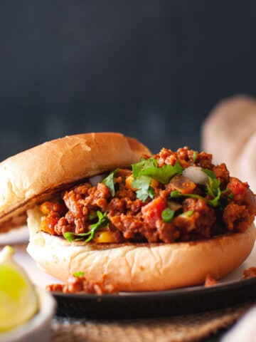 Black plate with Indian sloppy joes.