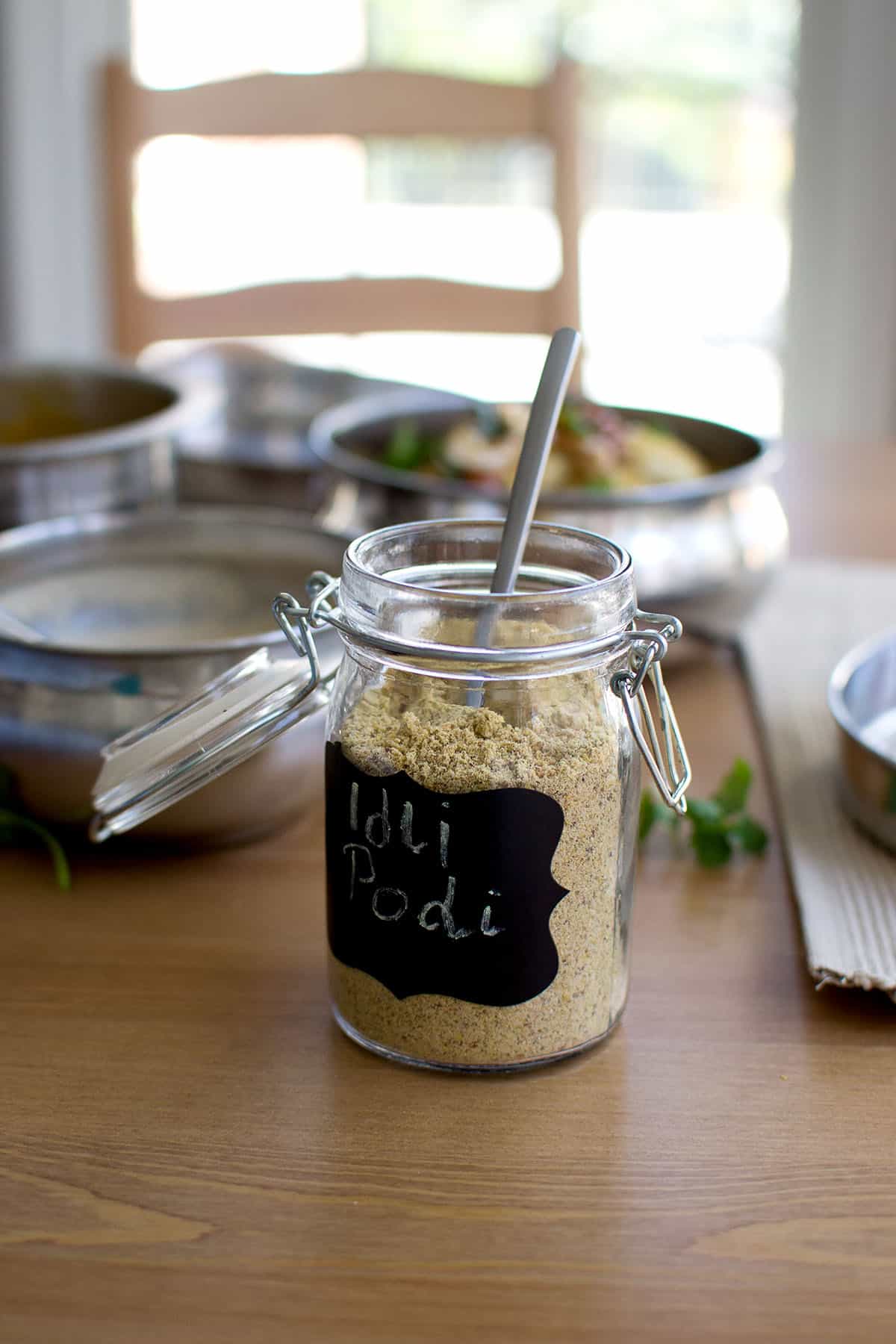 Glass jar with karam powder.