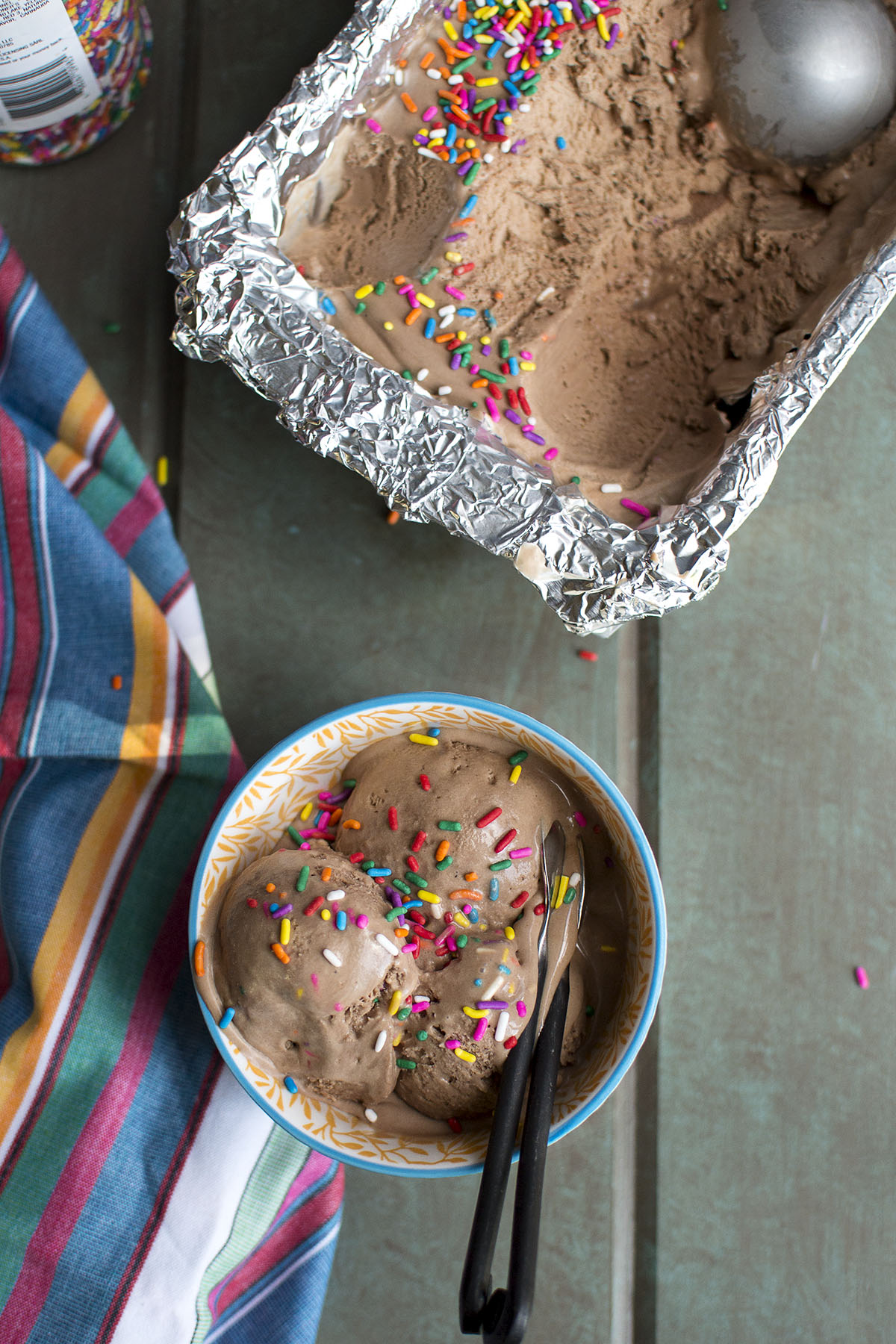 White bowl with 3 scoops of rainbow dash ice cream