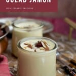 Wooden tray with glass jars of Indian dessert.