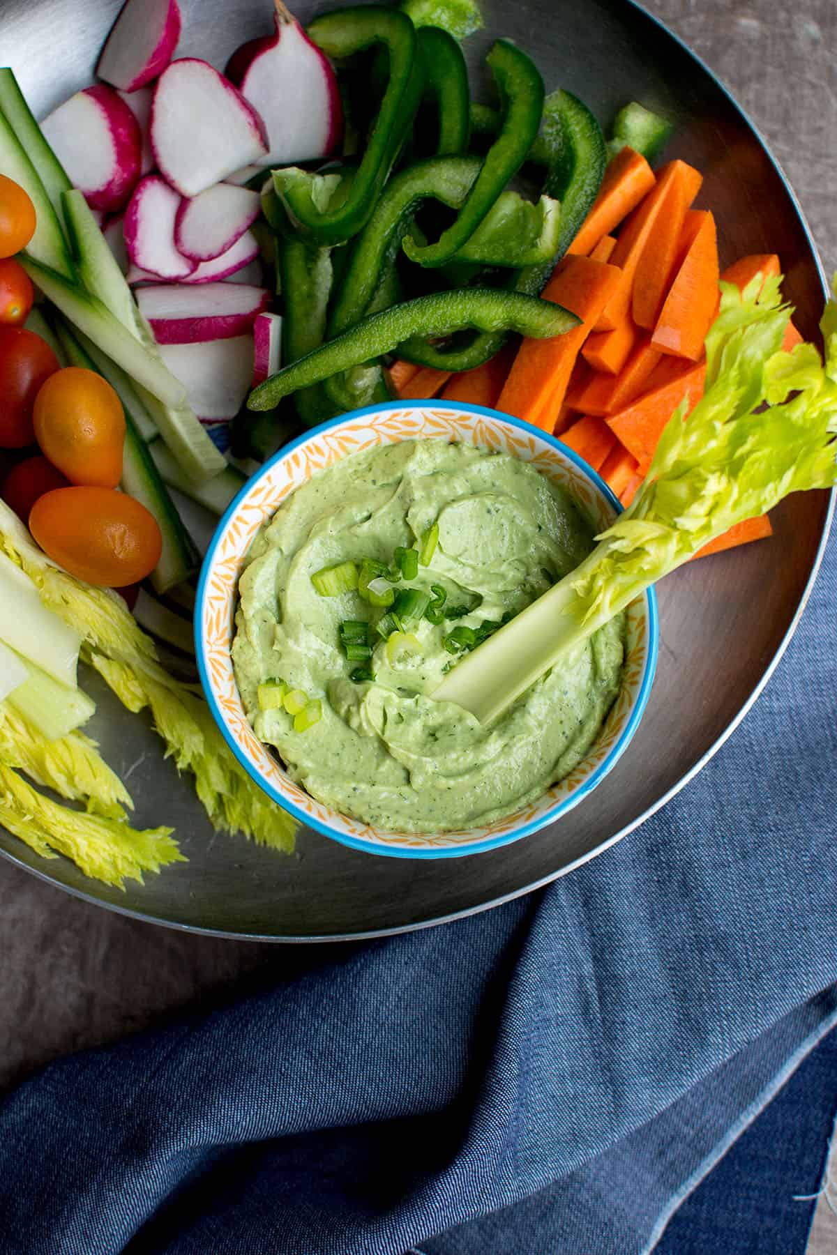 Tray with veggies and bowl of dip.