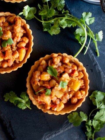 board with Chana chaat tart tartlets