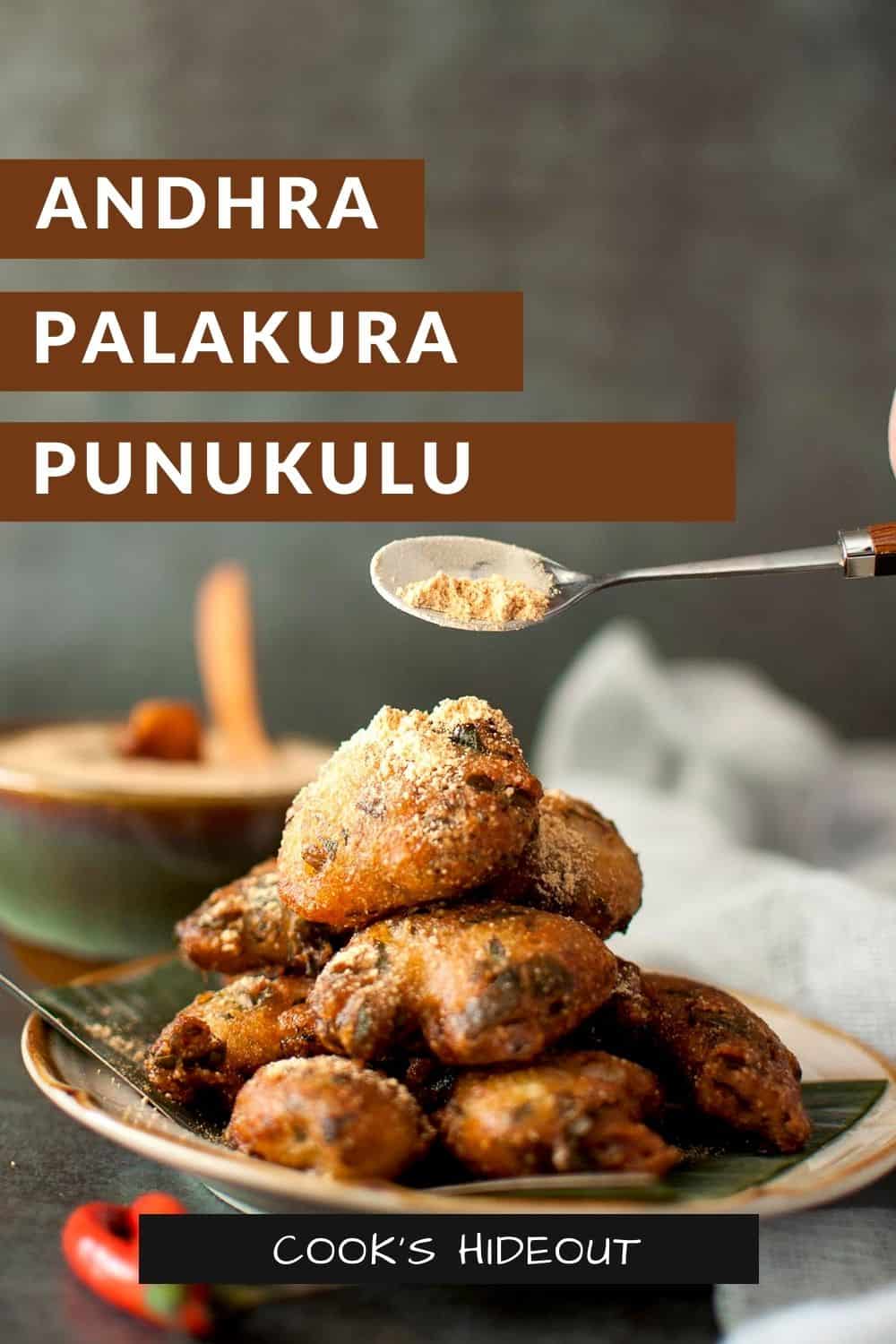 Spoon sprinkling spice powder on a stack of palakura punukulu