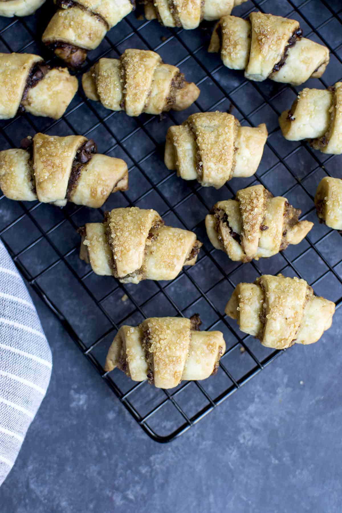 Wire rack topped with baked jewish cookies