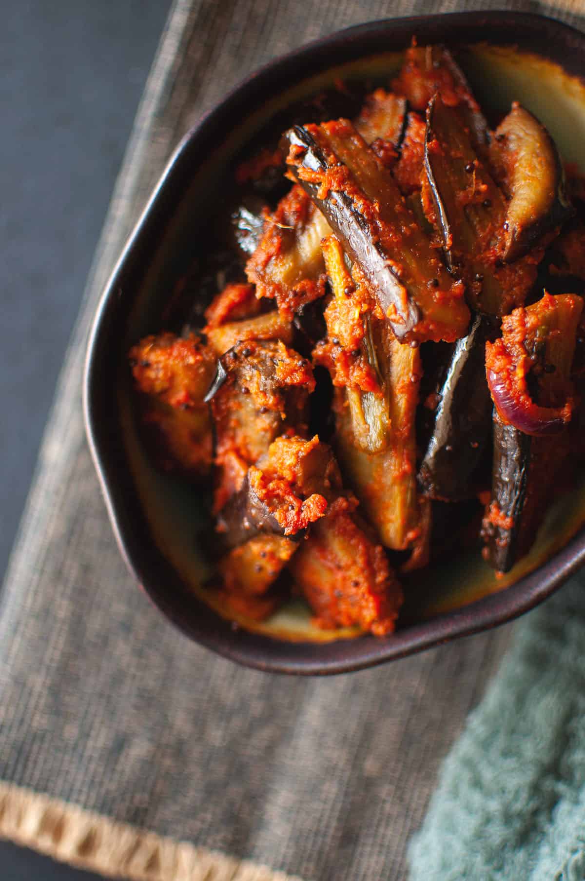 Top view of a bowl with eggplant pickle.