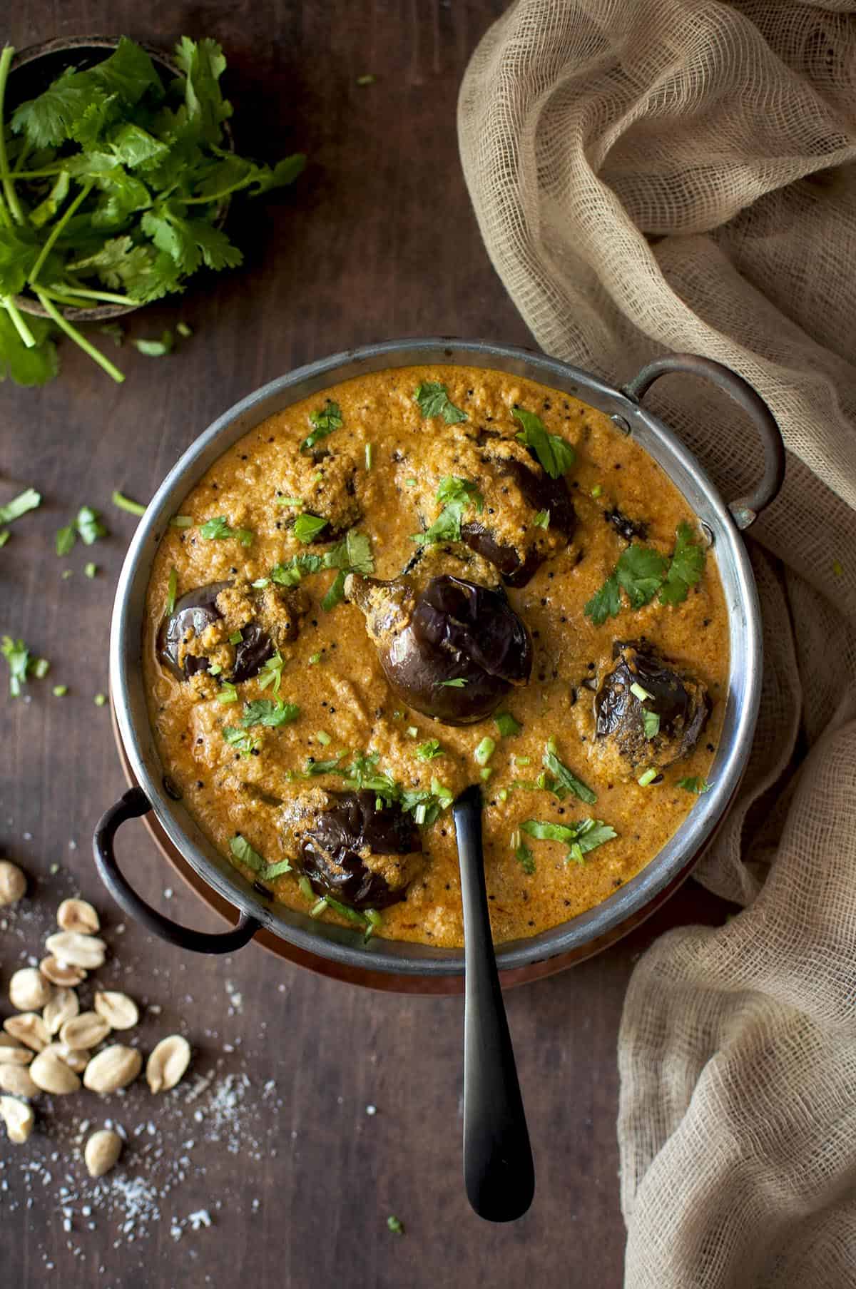 Bowl with bharli vangi and a spoon.