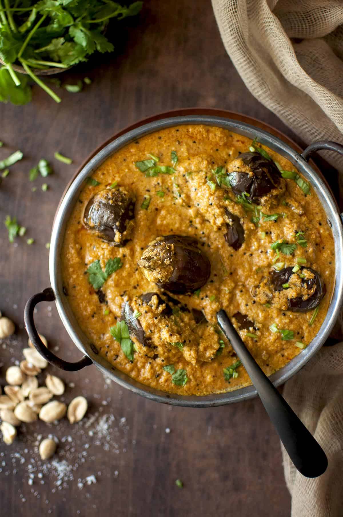 Bowl with bharli vangi and a spoon.